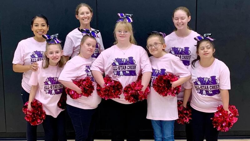 Cheerleaders on a squad for those with disabilities became a crowd favorite during a cheer...