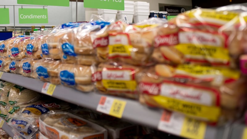 Basic grocery items including bread, juice, and condiments are available at Wal-Mart To Go in...