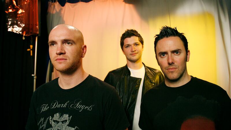 FILE - Band members from The Script, Mark Sheehan, left, Danny O'Donoghue, center, and Glen...