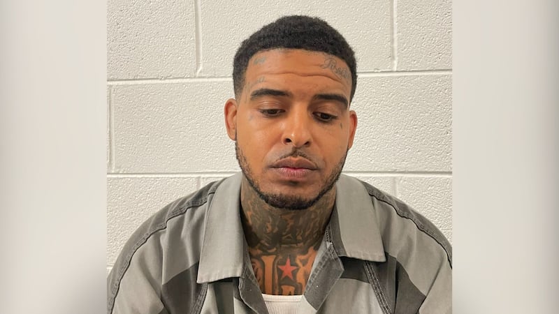 Drakar Rawlings, 31, is facing charges that include allowing access to firearms by children...