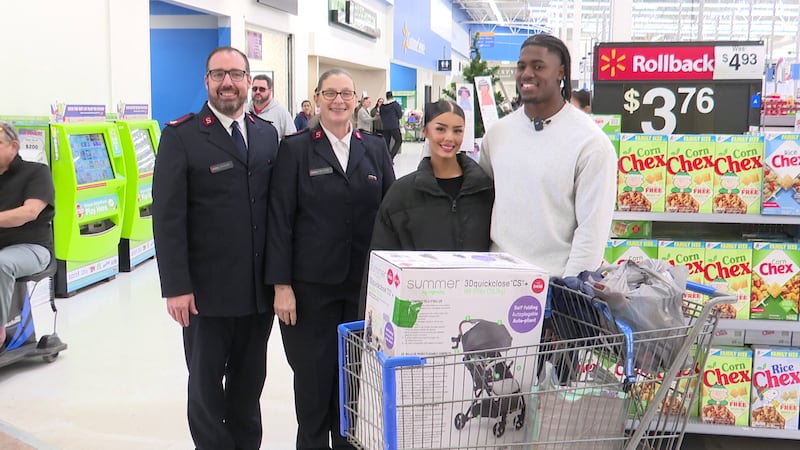 Price bought toys for the youngsters at the Mishawaka Walmart Friday.