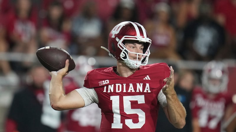 Indiana quarterback Fernando Mendoza throws during the first half of an NCAA college football...