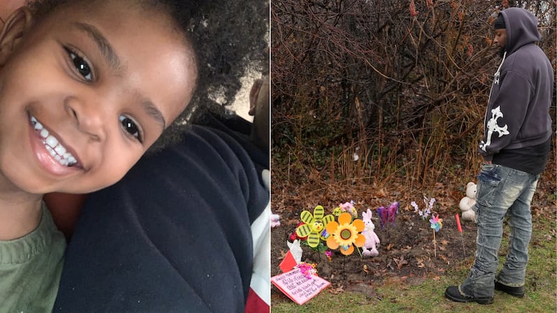 DeShaun Chatman, the father of one of the two girls whose bodies were found, stands at the...