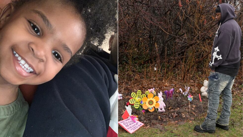 DeShaun Chatman, the father of one of the two girls whose bodies were found, stands at the...