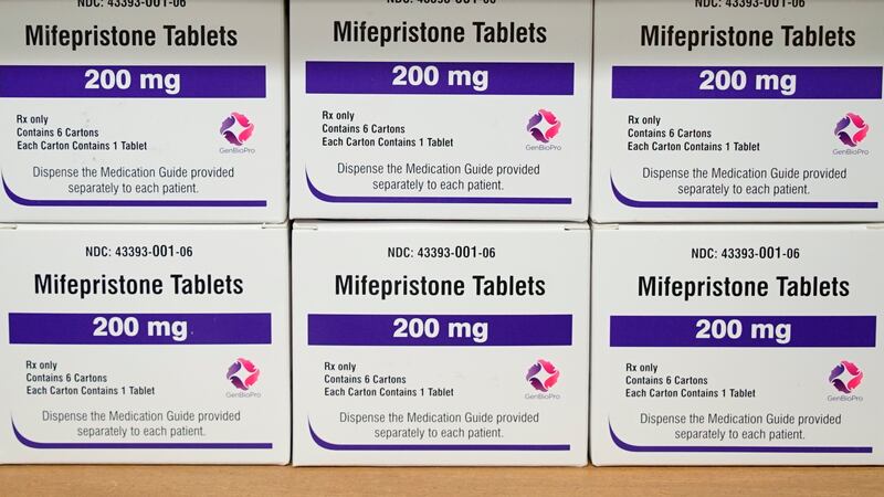 FILE - Boxes of the drug mifepristone sit on a shelf at the West Alabama Women's Center in...