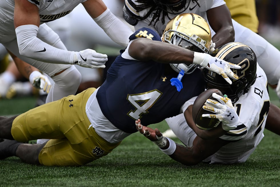 Notre Dame running back Jeremiyah Love (4) rushes near the goal line against Purdue's Tahj...