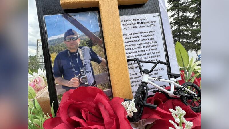 A memorial along C Street in Anchorage shows Radahamez Rodriguez Perez in photos, days after...