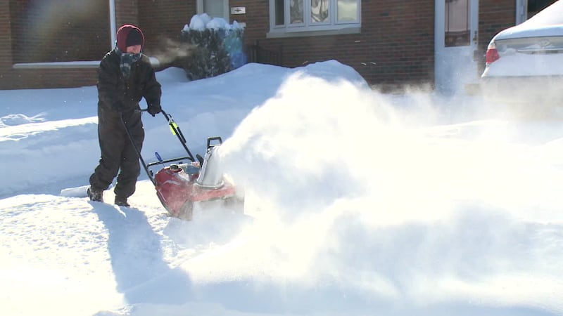 A file photo of a Michiana resident snowblowing.