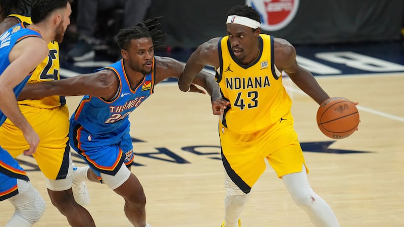 Indiana Pacers forward Pascal Siakam (43) drives as Oklahoma City Thunder guard Cason Wallace...