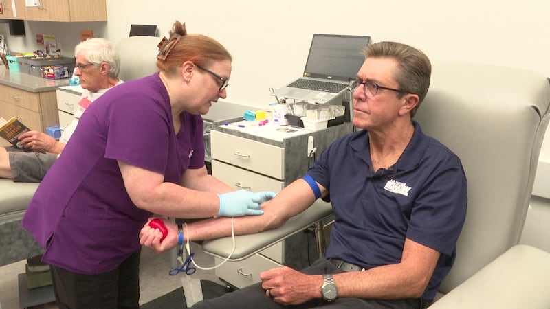 George Mallet donates blood