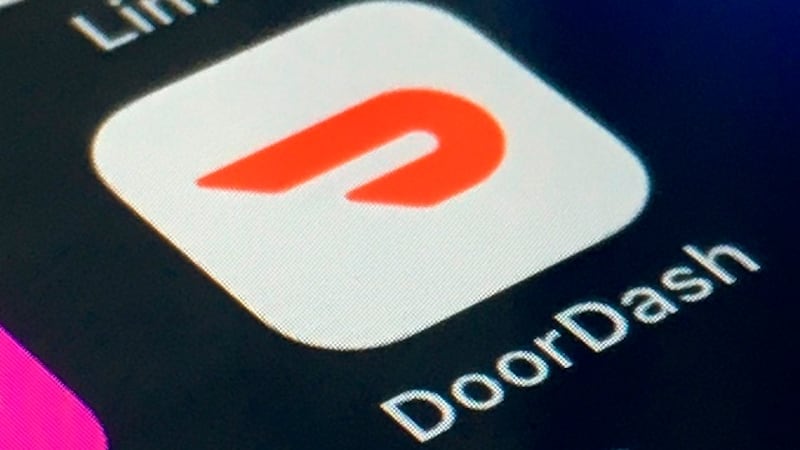 FILE - The DoorDash app is shown on a smartphone on Feb. 27, 2020, in New York. DoorDash will...