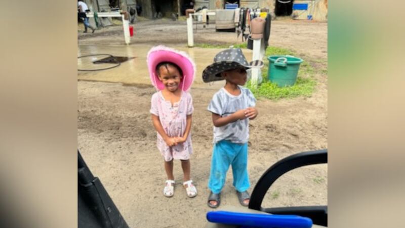 Community members gathered on Monday night after 5-year-old Brite Acoy was killed in a...