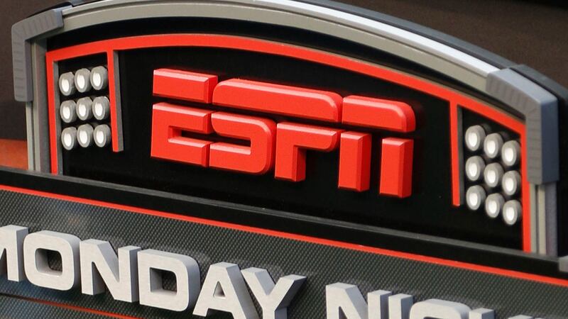 FILE - The ESPN logo is seen, Sept. 16, 2013, prior to an NFL football game between the...