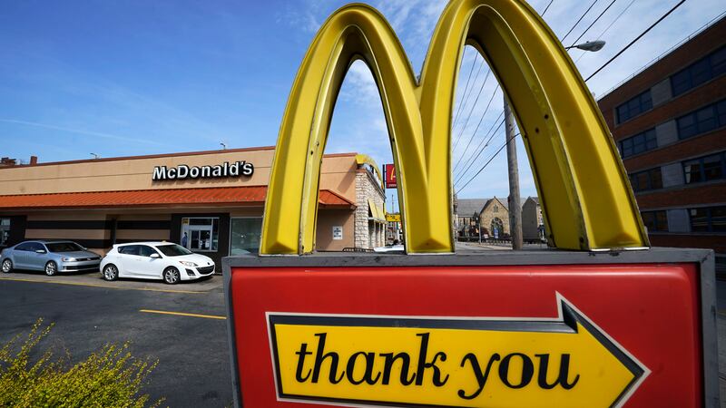 FILE - A sign is shown in front of an McDonald's restaurant in Pittsburgh on April 23, 2022.