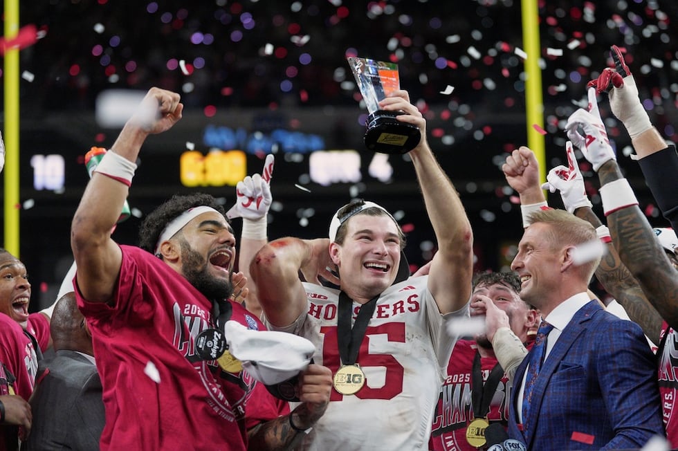 Indiana's Fernando Mendoza celebrates after the Big Ten championship NCAA college football...