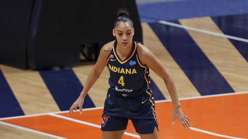 Indiana Fever's Kysre Gondrezick (4) during a WNBA basketball game against the Connecticut Sun...