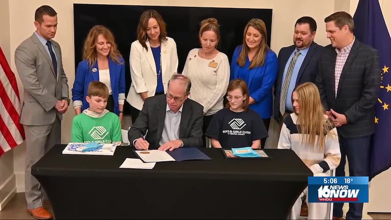 The governor highlighted the organization's role in serving 180,000 Hoosier children.